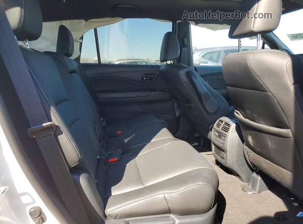 5FNYF8H02PB016037 2023 HONDA PASSPORT White Вид задніх сидінь