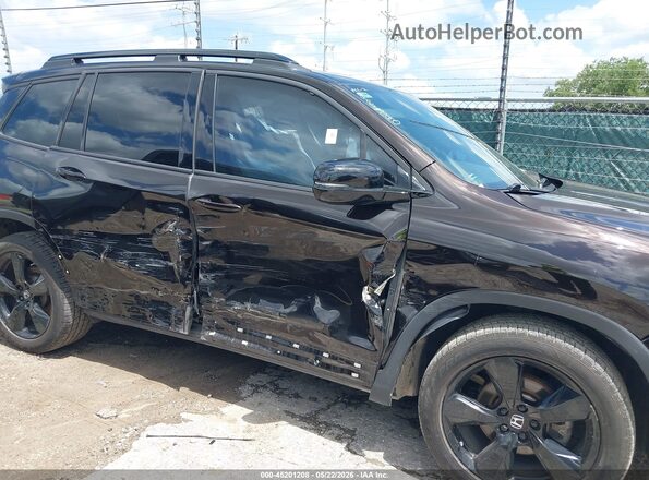 5FNYF8H08MB020668 2021 HONDA PASSPORT Dark Brown Вид задньої частини салону