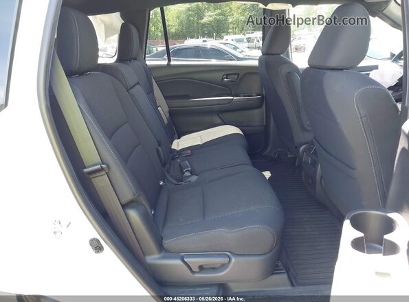 5FNYF8H2XMB034346 2021 HONDA PASSPORT White VIN sticker view