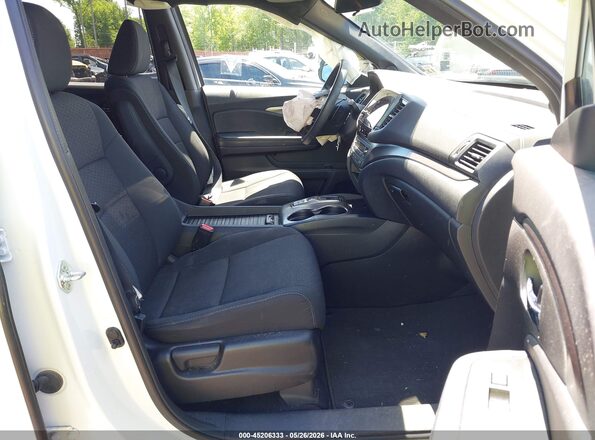 5FNYF8H2XMB034346 2021 HONDA PASSPORT White Front interior view
