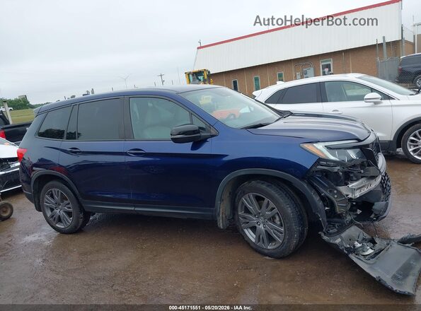5FNYF8H51KB018978 2019 HONDA PASSPORT Blue Rear interior view