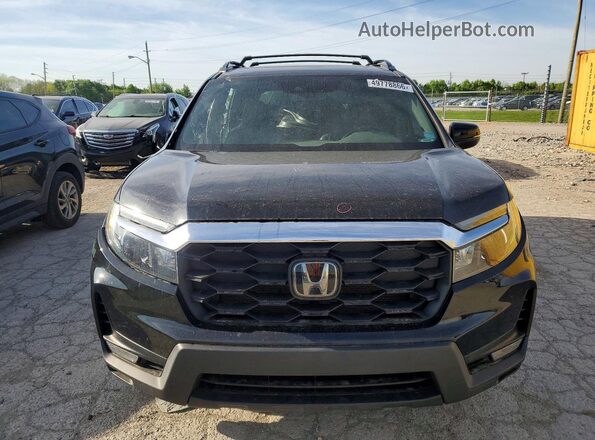 5FNYF8H52PB013909 2023 HONDA PASSPORT Black Widok z przodu