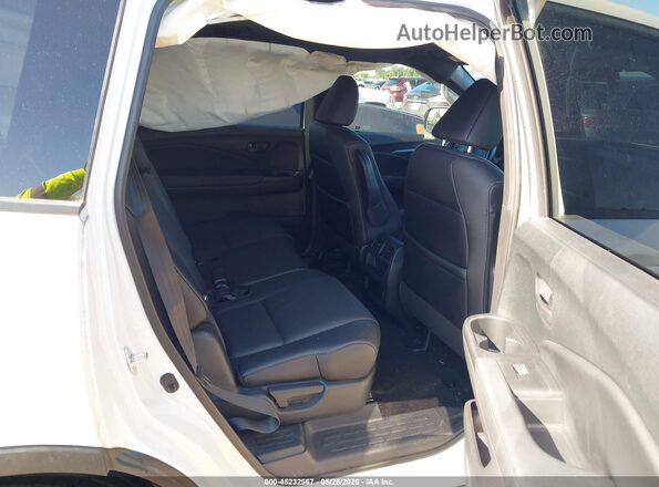 5FNYF8H54PB030095 2023 HONDA PASSPORT White Widok naklejki z numerem VIN