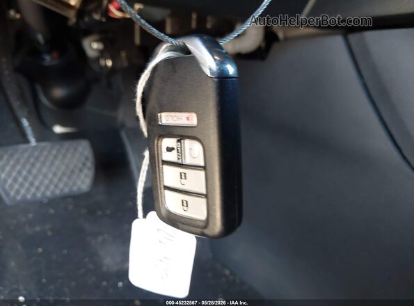5FNYF8H54PB030095 2023 HONDA PASSPORT White Widok deski rozdzielczej