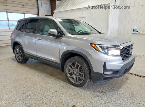 5FNYF8H54PB034339 2023 HONDA PASSPORT Серебряный Передняя правая четверть
