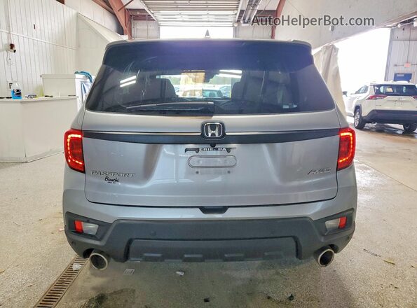 5FNYF8H54PB034339 2023 HONDA PASSPORT Серебряный Вид сзади