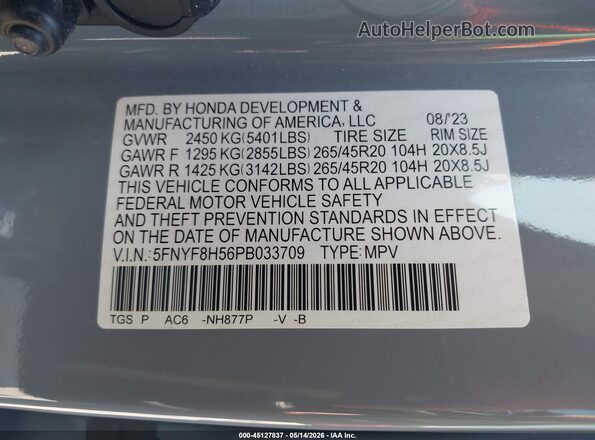 5FNYF8H56PB033709 2023 HONDA PASSPORT Blue Vista del compartimento del motor