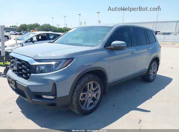 5FNYF8H56PB033709 2023 HONDA PASSPORT Blue Vista tres cuartos delantera izquierda