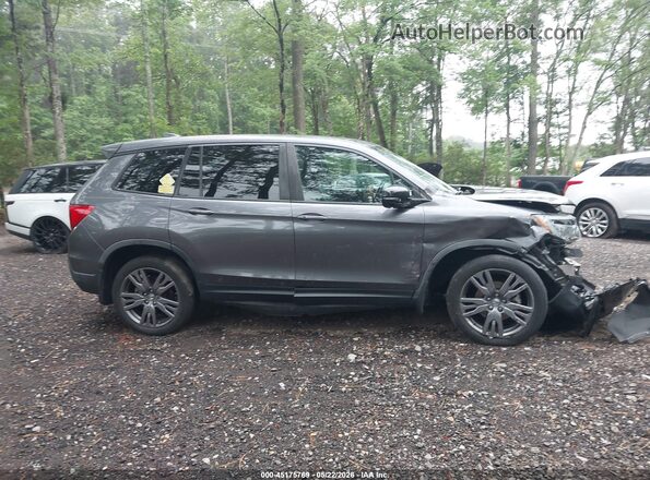 5FNYF8H5XMB004077 2021 HONDA PASSPORT Gray Vista interior trasera