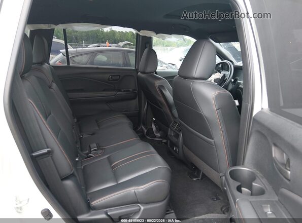 5FNYF8H60PB004344 2023 HONDA PASSPORT White Widok naklejki z numerem VIN