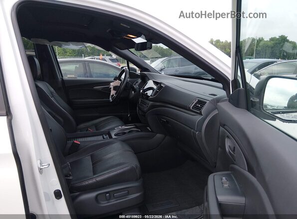 5FNYF8H60PB004344 2023 HONDA PASSPORT White Widok wnętrza z przodu