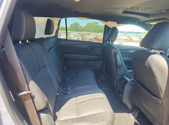 5FNYF8H67PB041357 2023 HONDA PASSPORT Gray Rear interior view