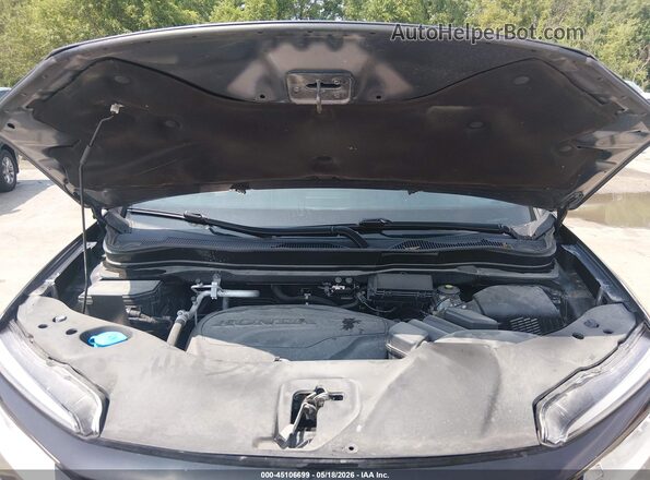 5FNYF8H90MB024034 2021 HONDA PASSPORT Gray Rear view