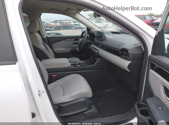 5FNYG1H29PB019183 2023 HONDA PILOT White Սալոնի դիմացի տեսք