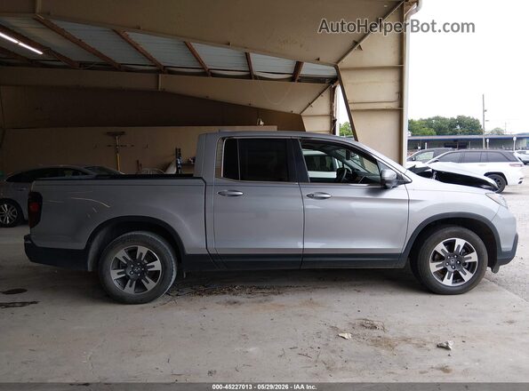 5FPYK2F63KB003037 2019 HONDA RIDGELINE Silver Rear interior view