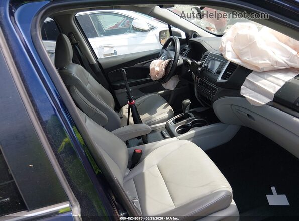 5FPYK3F54JB015418 2018 HONDA RIDGELINE Navy Front interior view