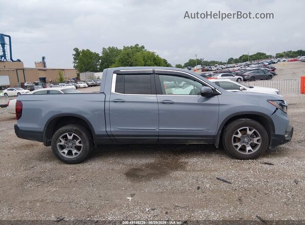 5FPYK3F57PB065237 2023 HONDA RIDGELINE Light Blue Rear interior view