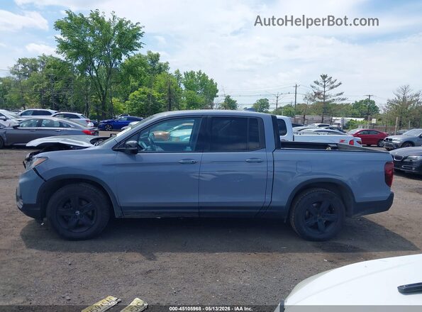 5FPYK3F84PB031301 2023 HONDA RIDGELINE Light Blue Սալոնի հետևի տեսք