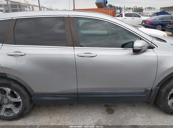 5J6RW1H55JA009889 2018 HONDA CR-V Silver Rear interior view