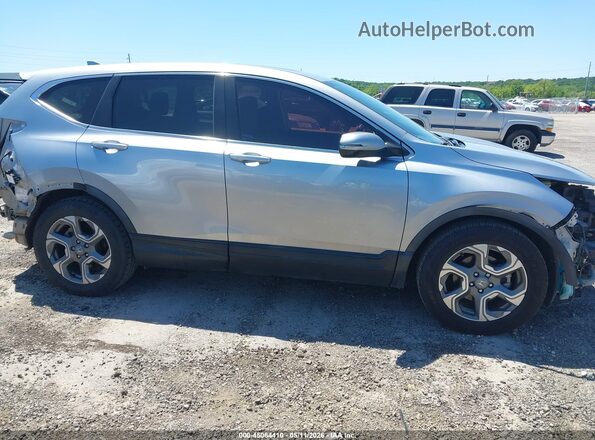 5J6RW1H59KA034859 2019 HONDA CR-V Silver Rear interior view