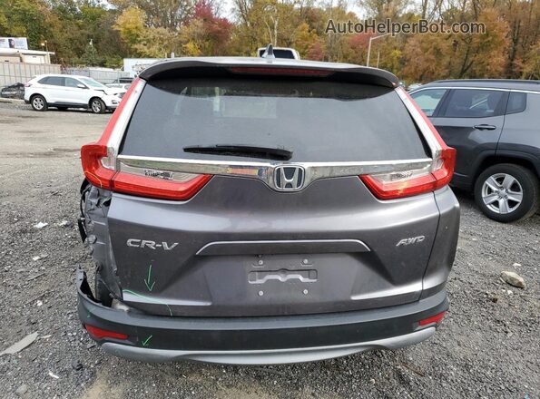 5J6RW2H54KA007557 2019 HONDA CR-V Gray Rear view