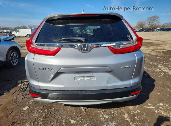 5J6RW2H55JL035337 2018 HONDA CR-V Silver Widok z tyłu