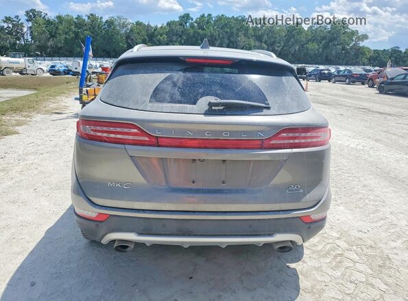 5LMCJ1C95GUJ27803 2016 LINCOLN MKC Beige Vista trasera