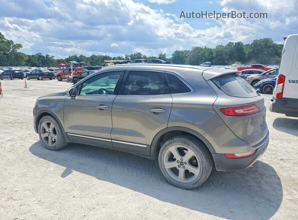5LMCJ1C95GUJ27803 2016 LINCOLN MKC Beige Trasero izquierdo