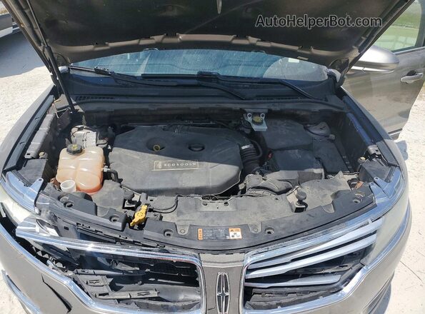 5LMCJ1C95GUJ27803 2016 LINCOLN MKC Beige Vista del compartimento del motor