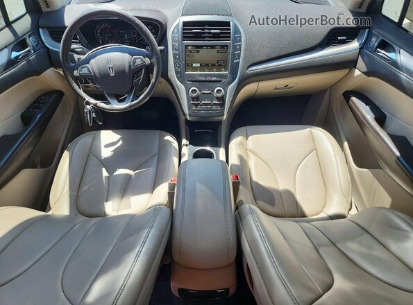 5LMCJ1C96HUL50210 2017 LINCOLN MKC Желто-коричневый Вид панели приборов