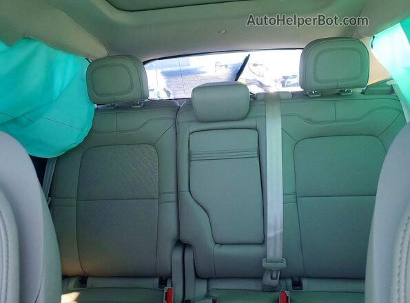 5LMCJ1DA9RUL08656 2024 LINCOLN TOWNHOUSE CORSAIR Red Rear seats view