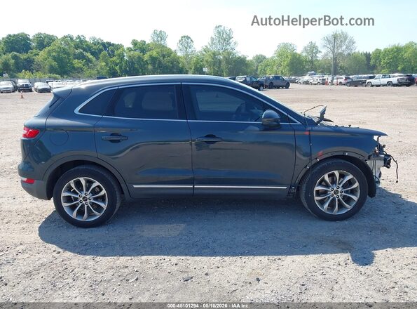 5LMCJ2C90KUL11903 2019 LINCOLN MKC Green Rear interior view