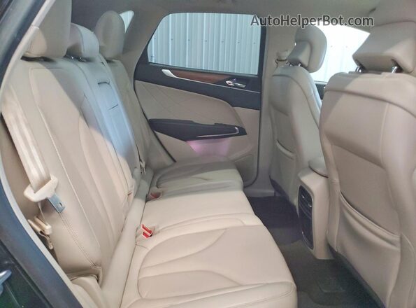 5LMCJ2C90KUL48658 2019 LINCOLN MKC Black Vista interior trasera