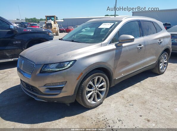 5LMCJ2C96KUL25708 2019 LINCOLN MKC Champagne წინა მარცხენა ხედი სამი მეოთხედიდან