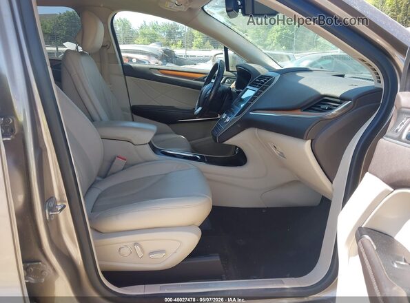 5LMCJ2C96KUL25708 2019 LINCOLN MKC Champagne წინა სალონის ხედი