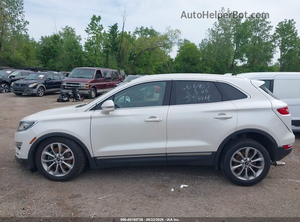 5LMCJ2D90JUL14751 2018 LINCOLN MKC Белый Вид задней части салона