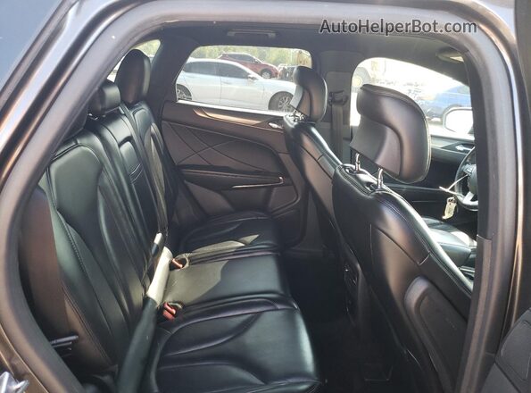 5LMCJ2D92KUL12744 2019 LINCOLN MKC Gray Vista de los asientos traseros