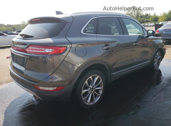 5LMCJ2D92KUL12744 2019 LINCOLN MKC Gray Trasero derecho