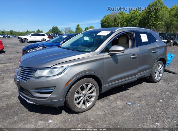 5LMCJ2D98HUL61164 2017 LINCOLN MKC Gray Front left
