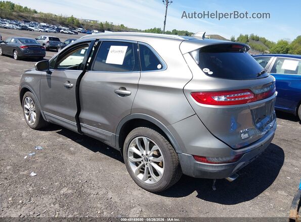 5LMCJ2D98HUL61164 2017 LINCOLN MKC Gray Rear left