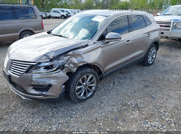 5LMCJ2D99JUL04722 2018 LINCOLN MKC Champagne წინა მარცხენა ხედი სამი მეოთხედიდან