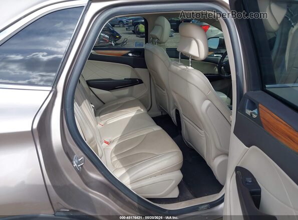 5LMCJ2D99JUL04722 2018 LINCOLN MKC Champagne VIN კოდის სტიკერის ხედი