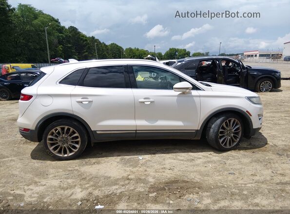 5LMCJ3C93HUL72077 2017 LINCOLN MKC Yellow Вид задньої частини салону