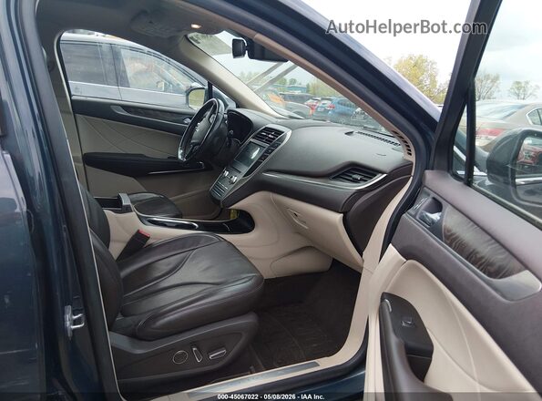 5LMCJ3C93KUL26224 2019 LINCOLN MKC Blue Front interior view