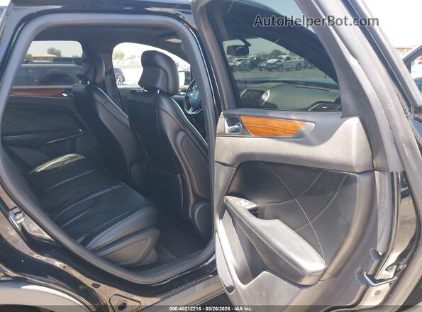 5LMCJ3C99GUJ04696 2016 LINCOLN MKC Black Widok naklejki z numerem VIN