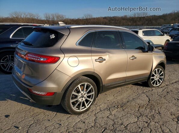 5LMCJ3C9XKUL15544 2019 LINCOLN MKC Tan Հետևի աջ