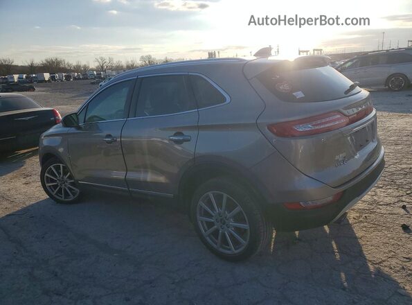5LMCJ3C9XKUL15544 2019 LINCOLN MKC Tan Հետևի ձախ