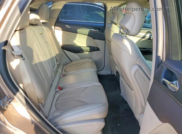 5LMCJ3C9XKUL15544 2019 LINCOLN MKC Tan Սալոնի հետևի տեսք