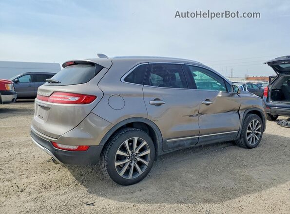 5LMCJ3D95KUL09522 2019 LINCOLN MKC Gold 