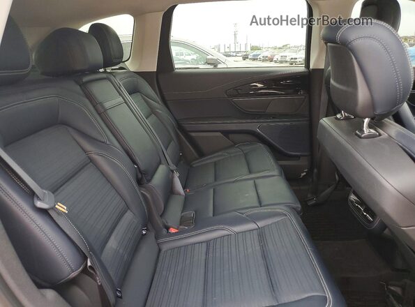 5LMPJ8KA3RJ793911 2024 LINCOLN NAUTILUS White Vista interior trasera